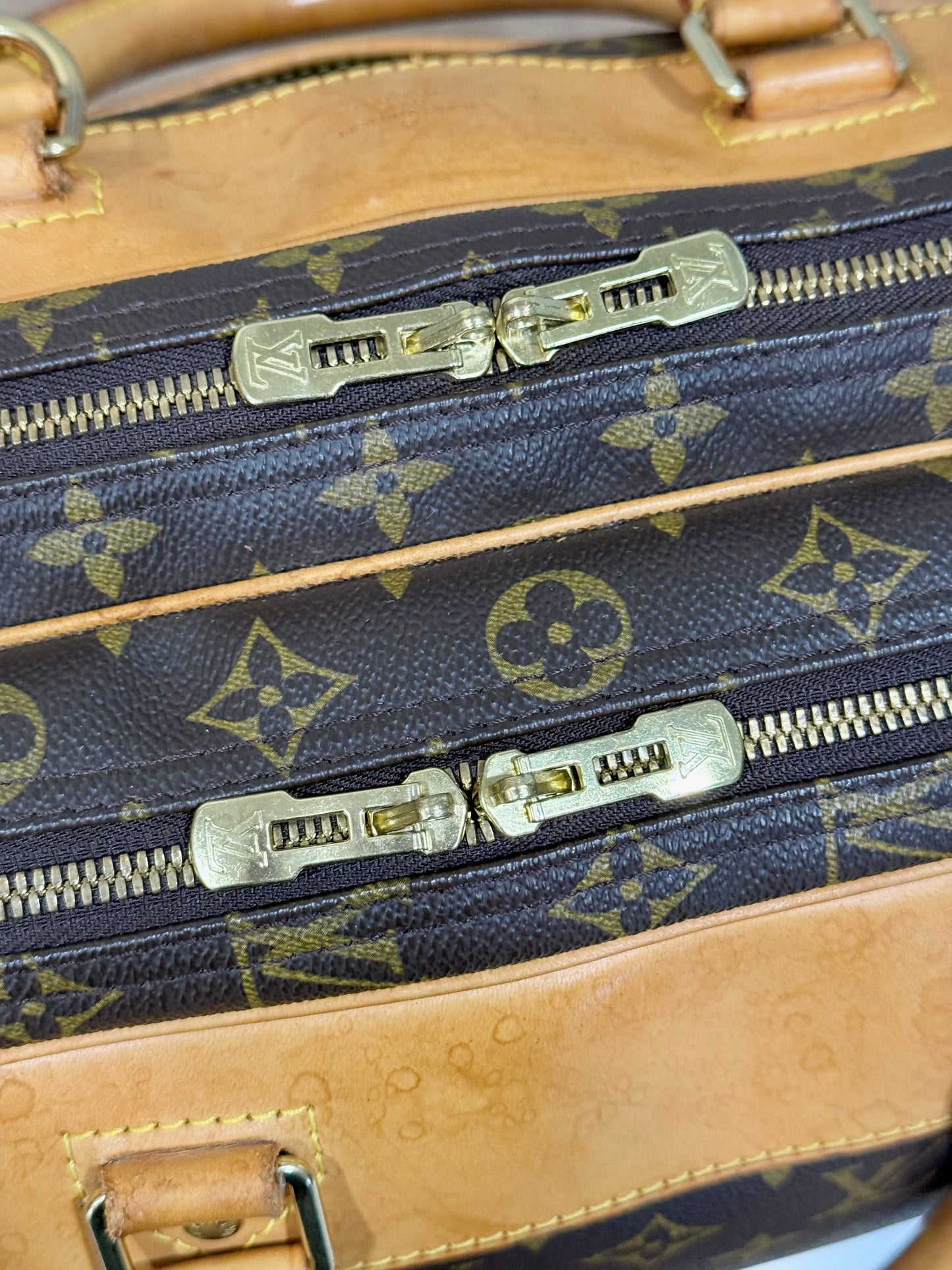 Louis Vuitton Alize 24 Mono soft Suitcase