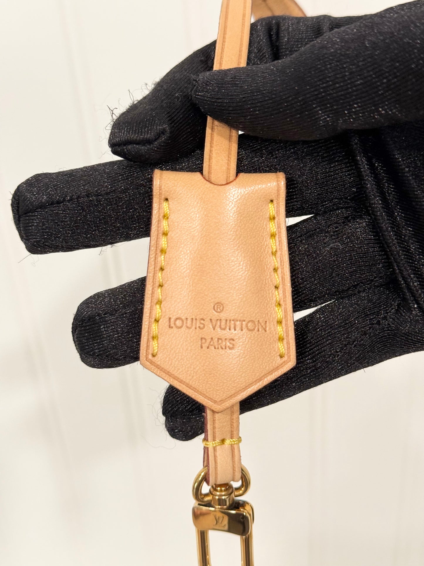 Louis Vuitton Vachetta Clochette with Clasp End