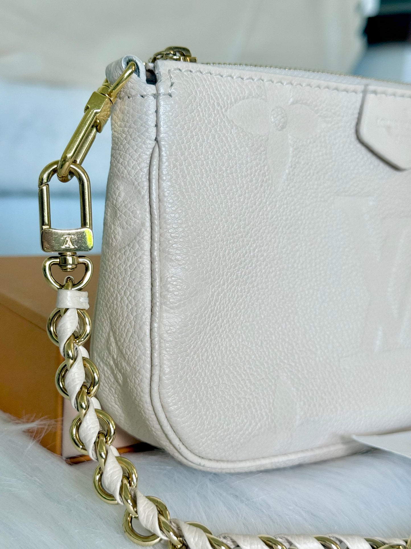 Louis Vuitton Small Pochette Giant Empreinte Cream from MPA