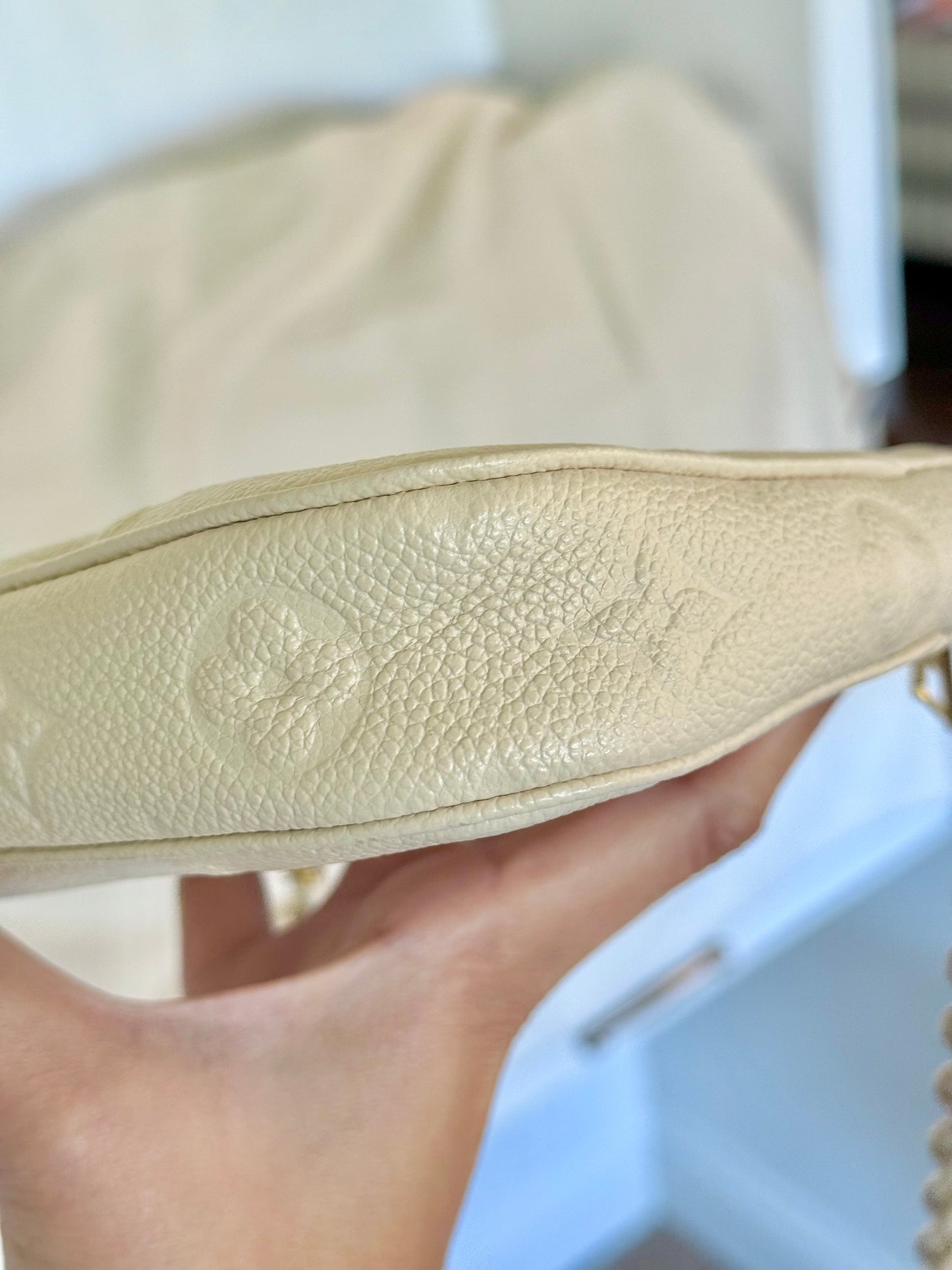 Louis Vuitton Small Pochette Giant Empreinte Cream from MPA