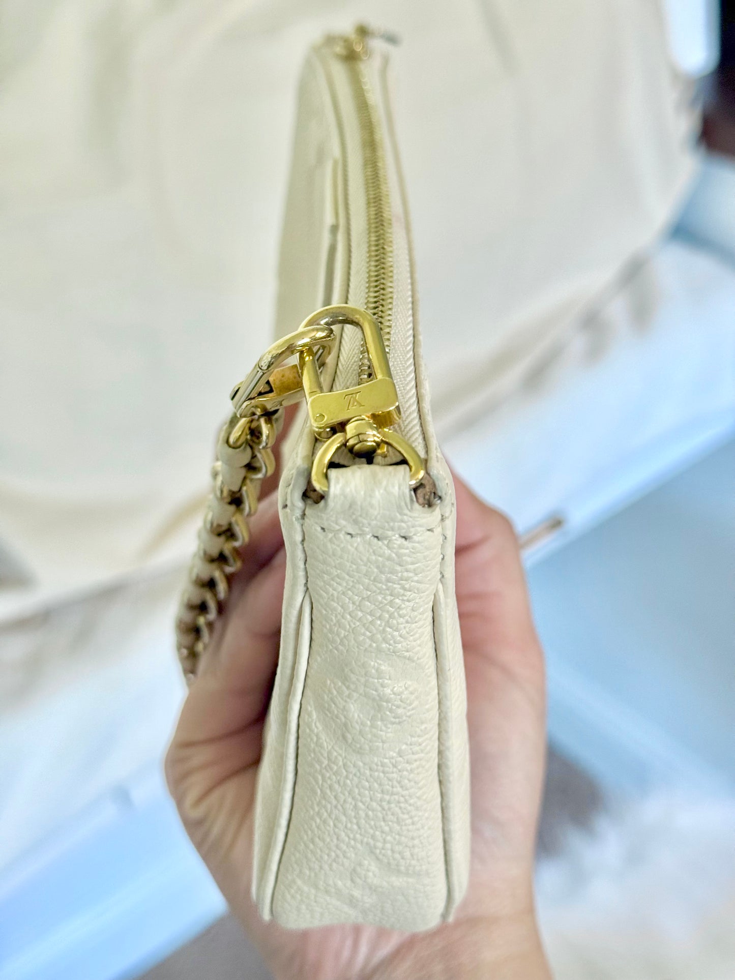 Louis Vuitton Small Pochette Giant Empreinte Cream from MPA