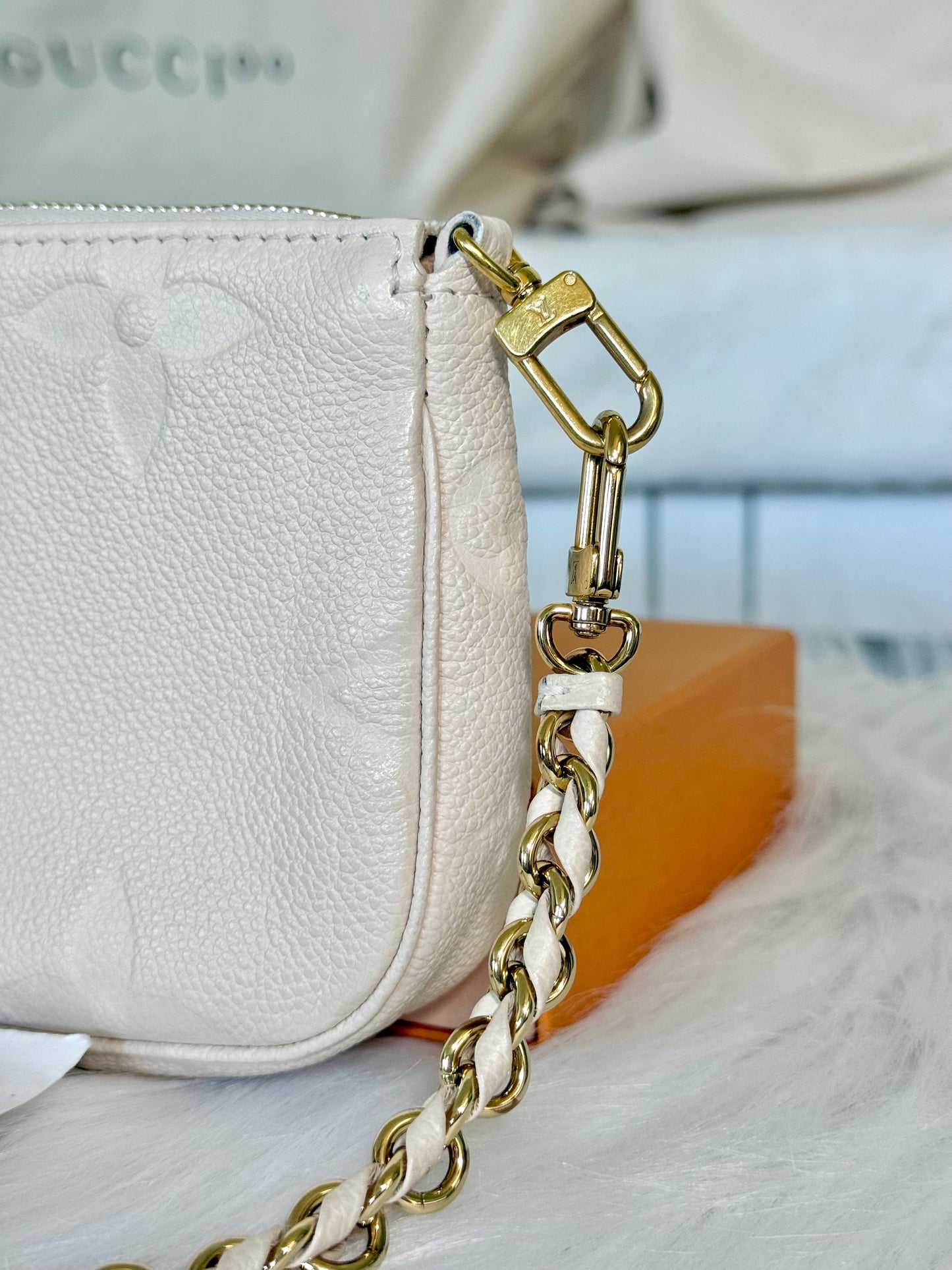 Louis Vuitton Small Pochette Giant Empreinte Cream from MPA