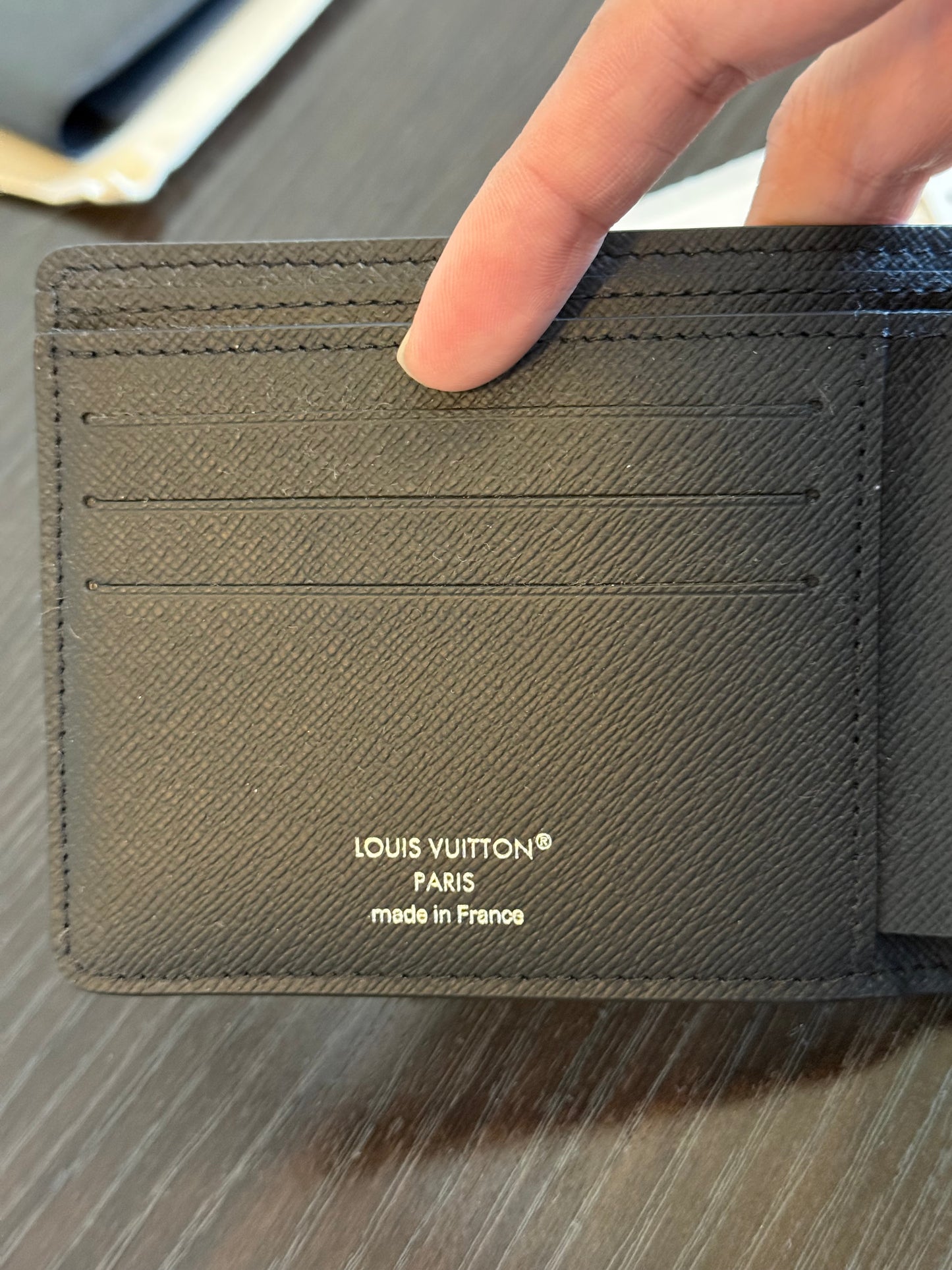 Louis Vuitton Multiple Wallet in Taiga Noir Silver HW