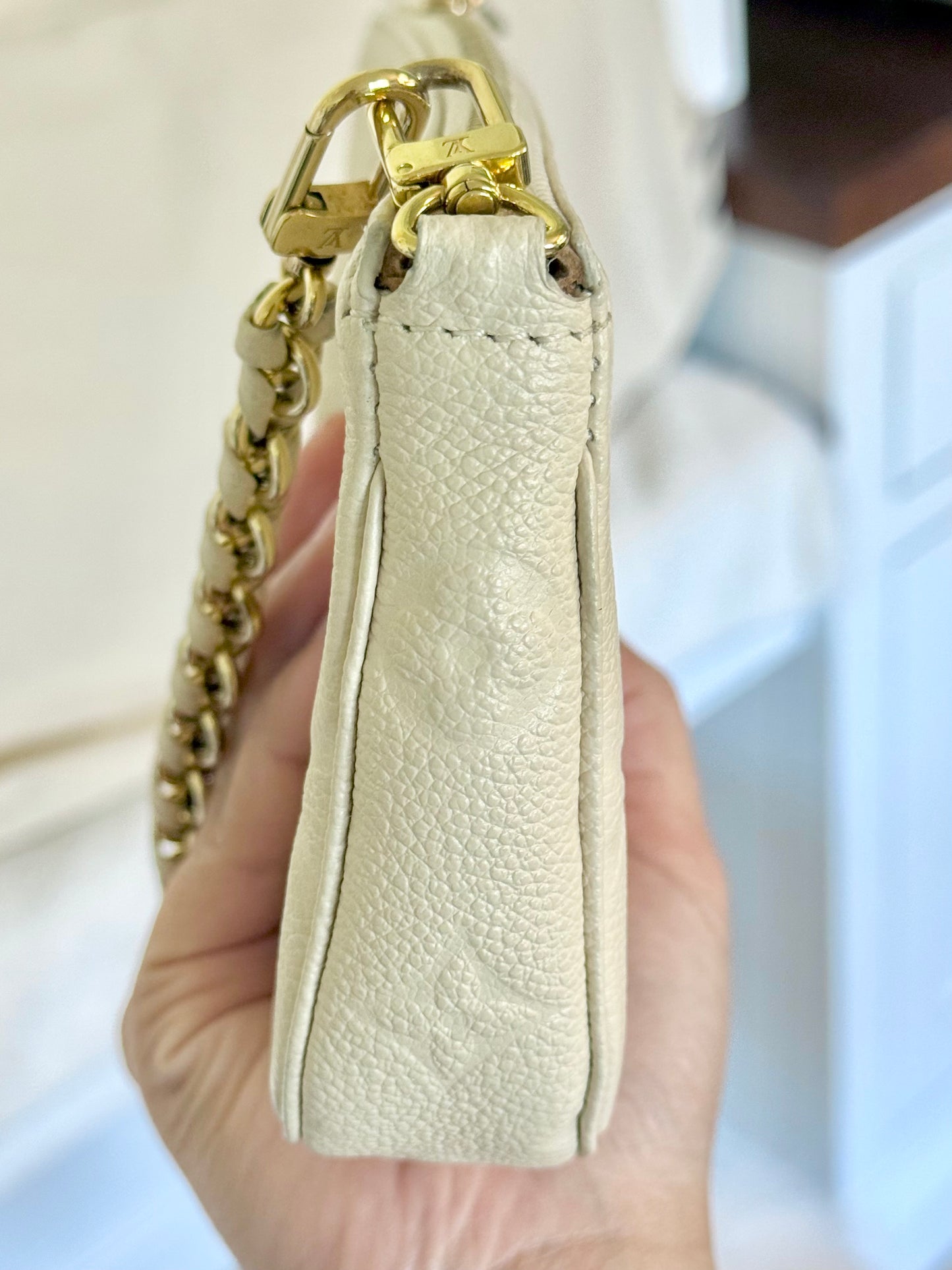 Louis Vuitton Small Pochette Giant Empreinte Cream from MPA