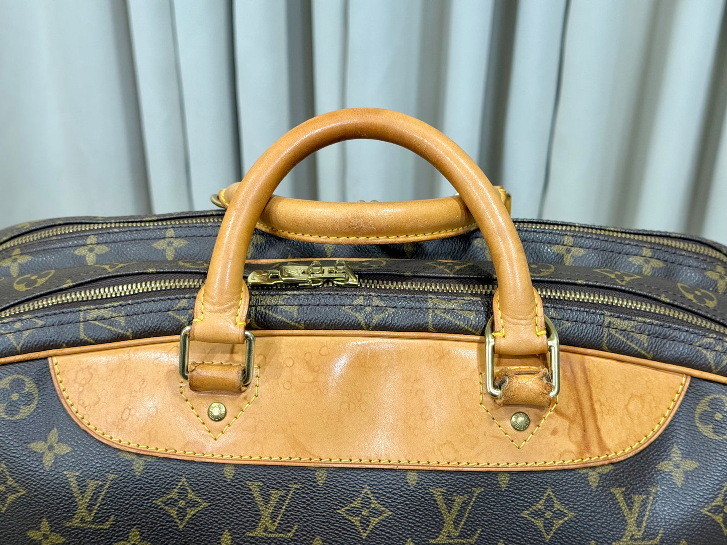 Louis Vuitton Alize 24 Mono soft Suitcase
