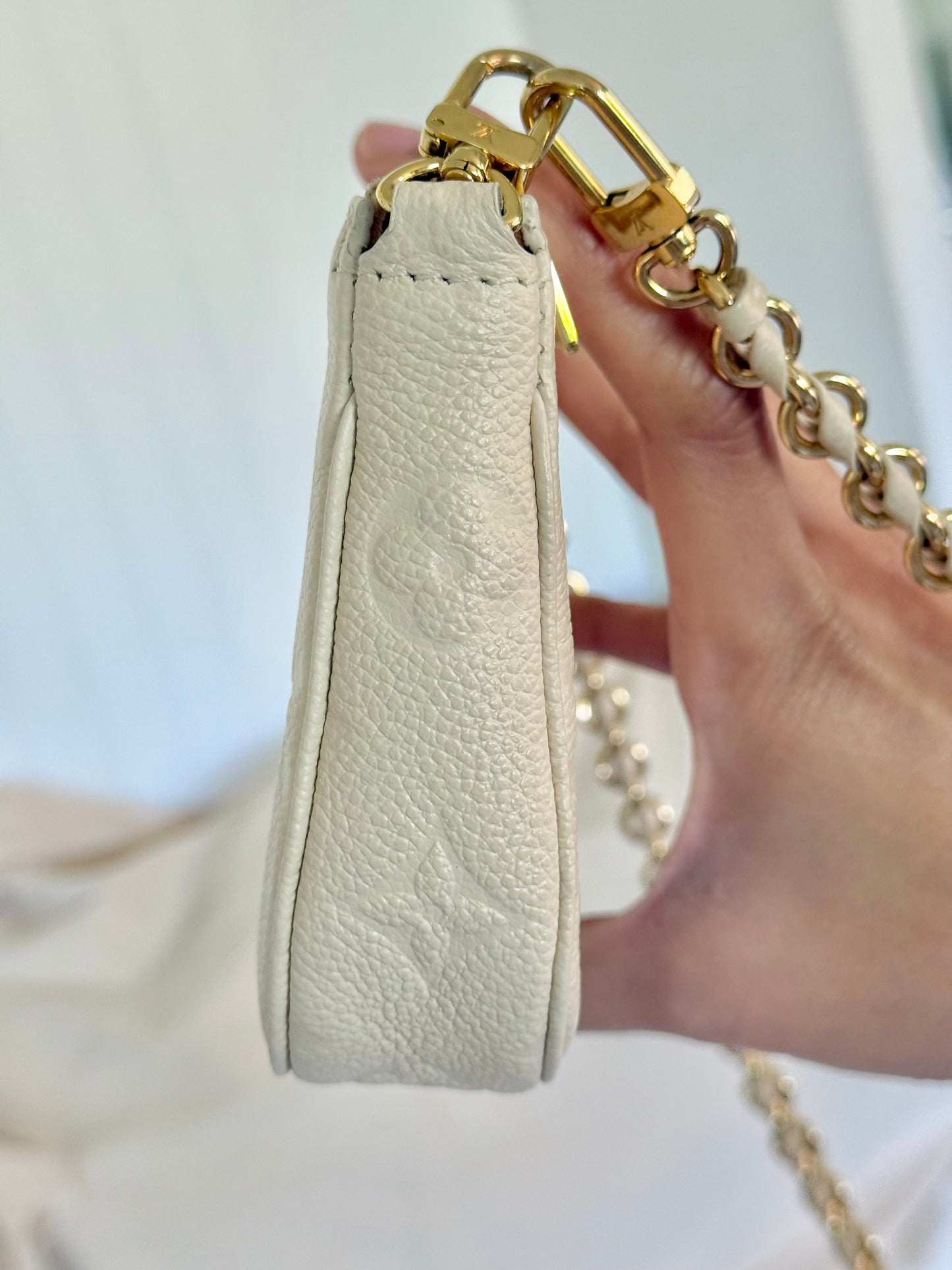 Louis Vuitton Small Pochette Giant Empreinte Cream from MPA