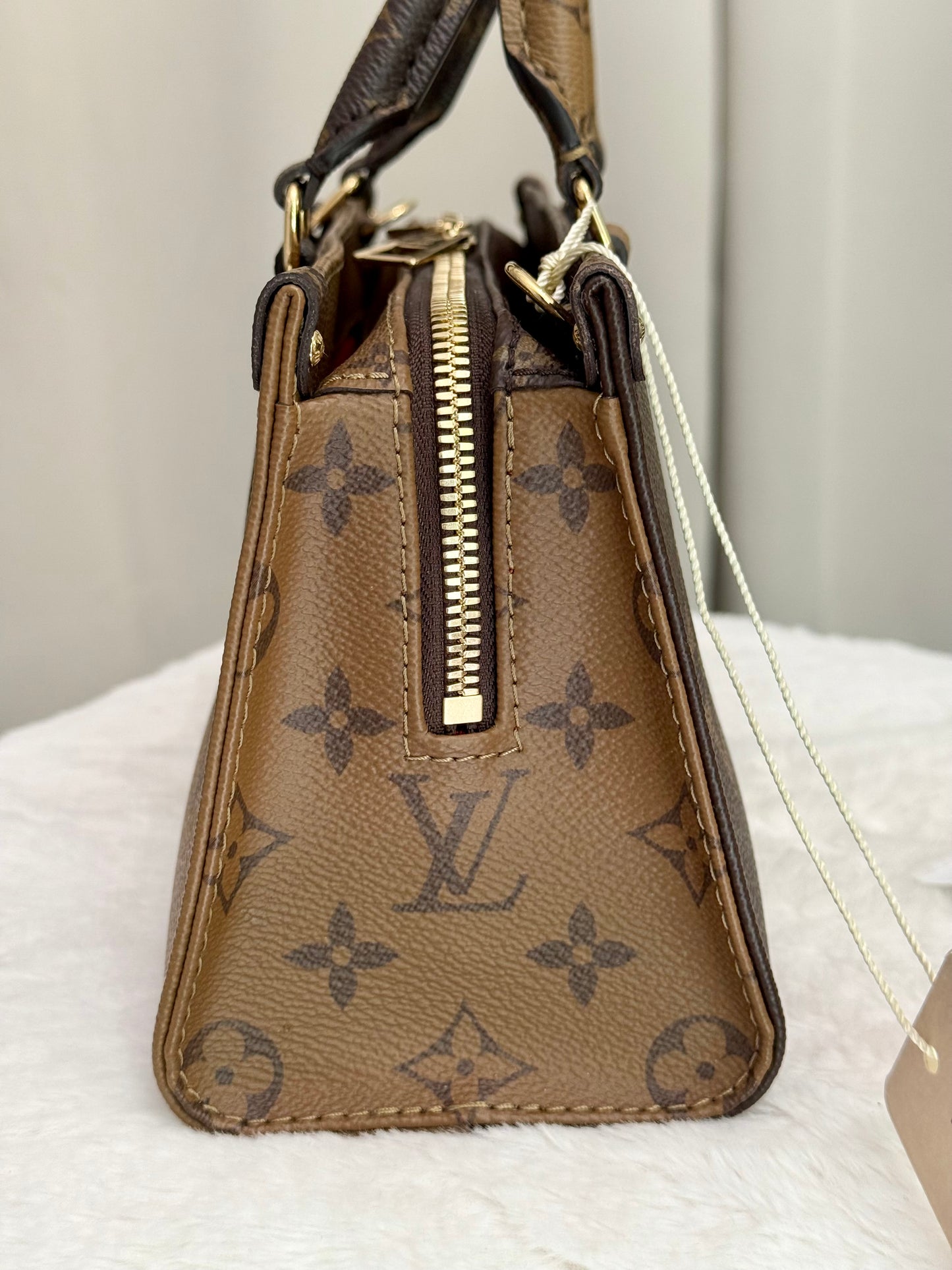 Louis Vuitton Onthego East West in Reverse Mono