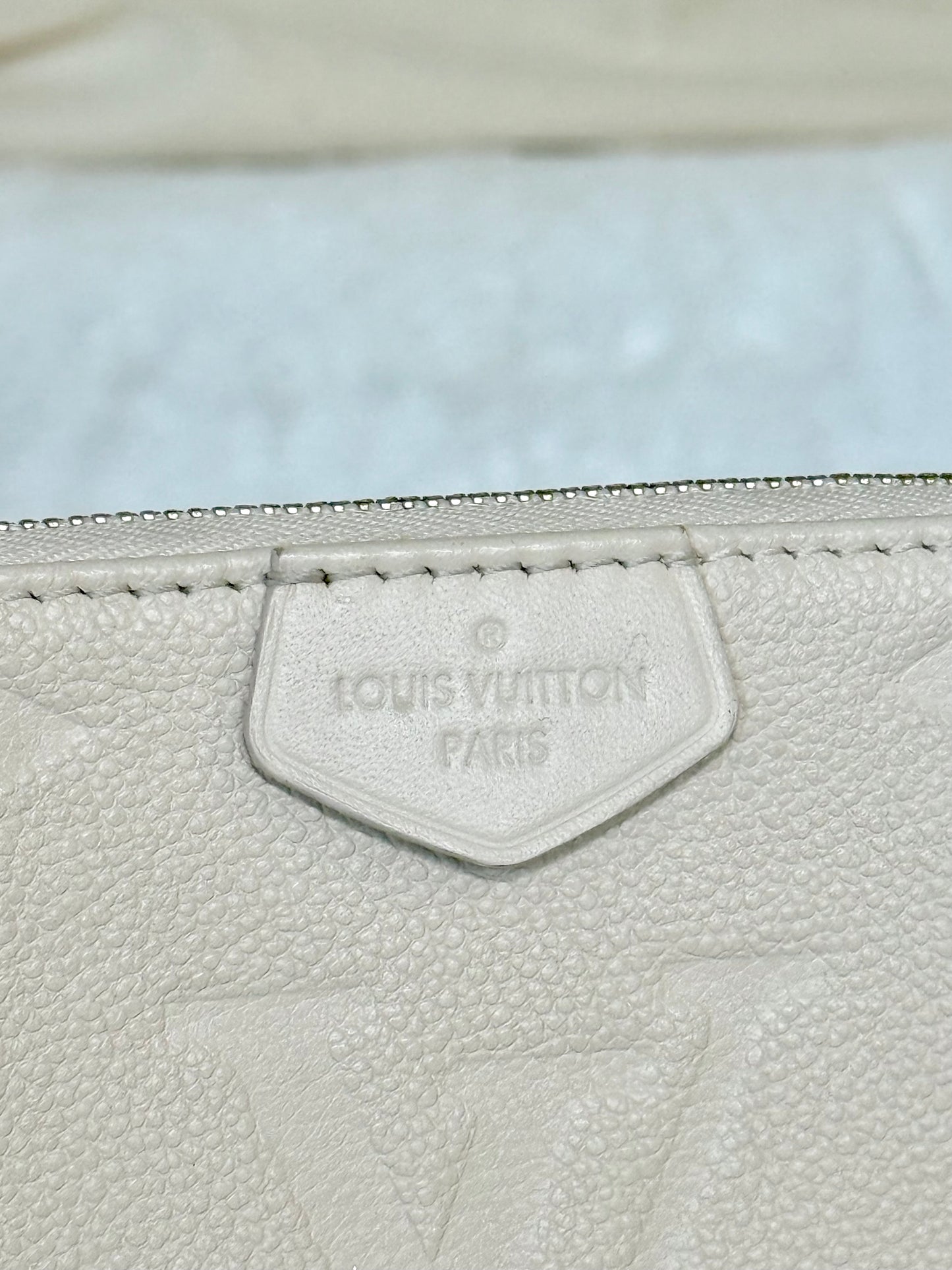 Louis Vuitton Small Pochette Giant Empreinte Cream from MPA