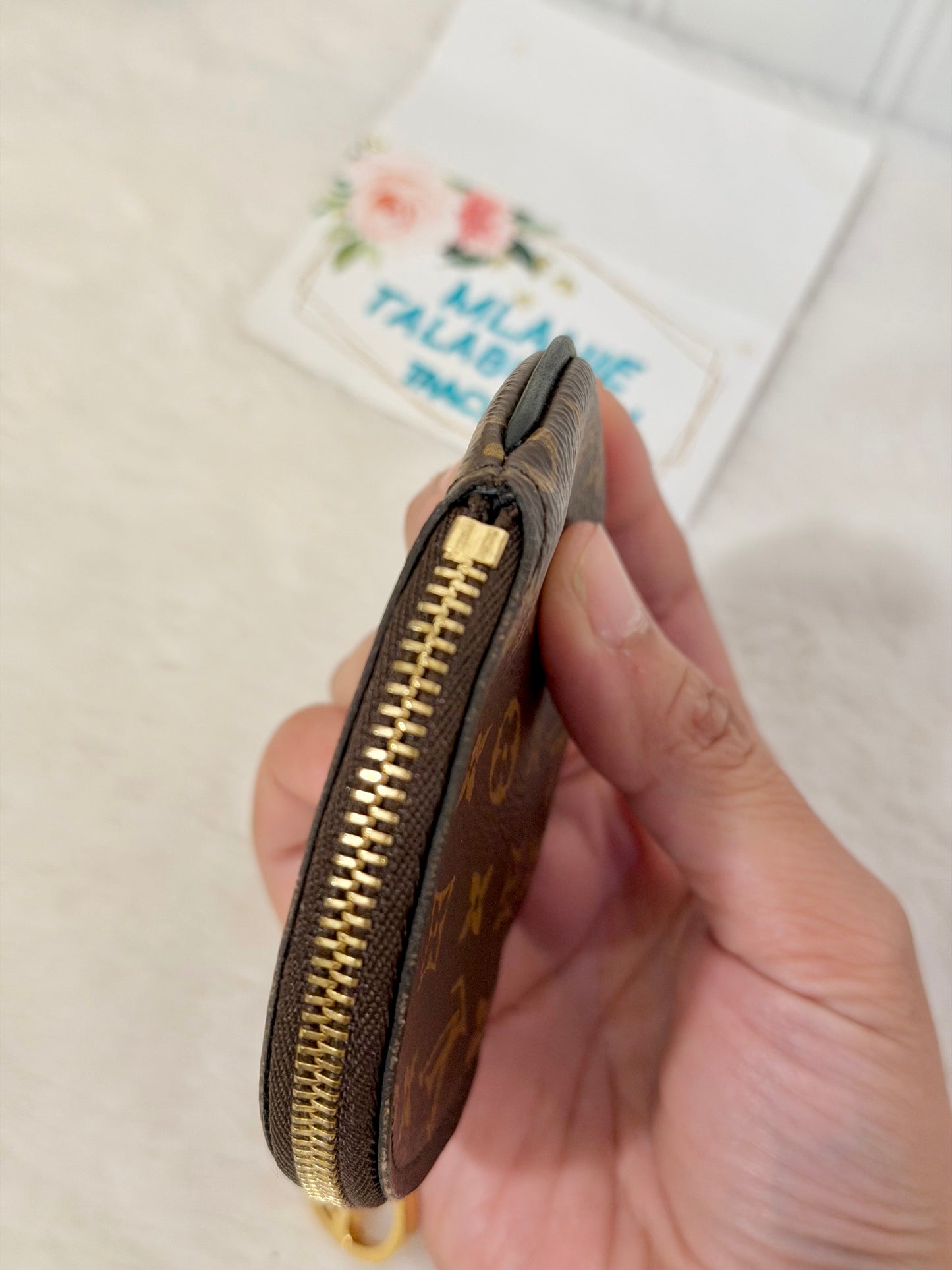 Louis Vuitton Round Coin Pouch from Trio Pouch
