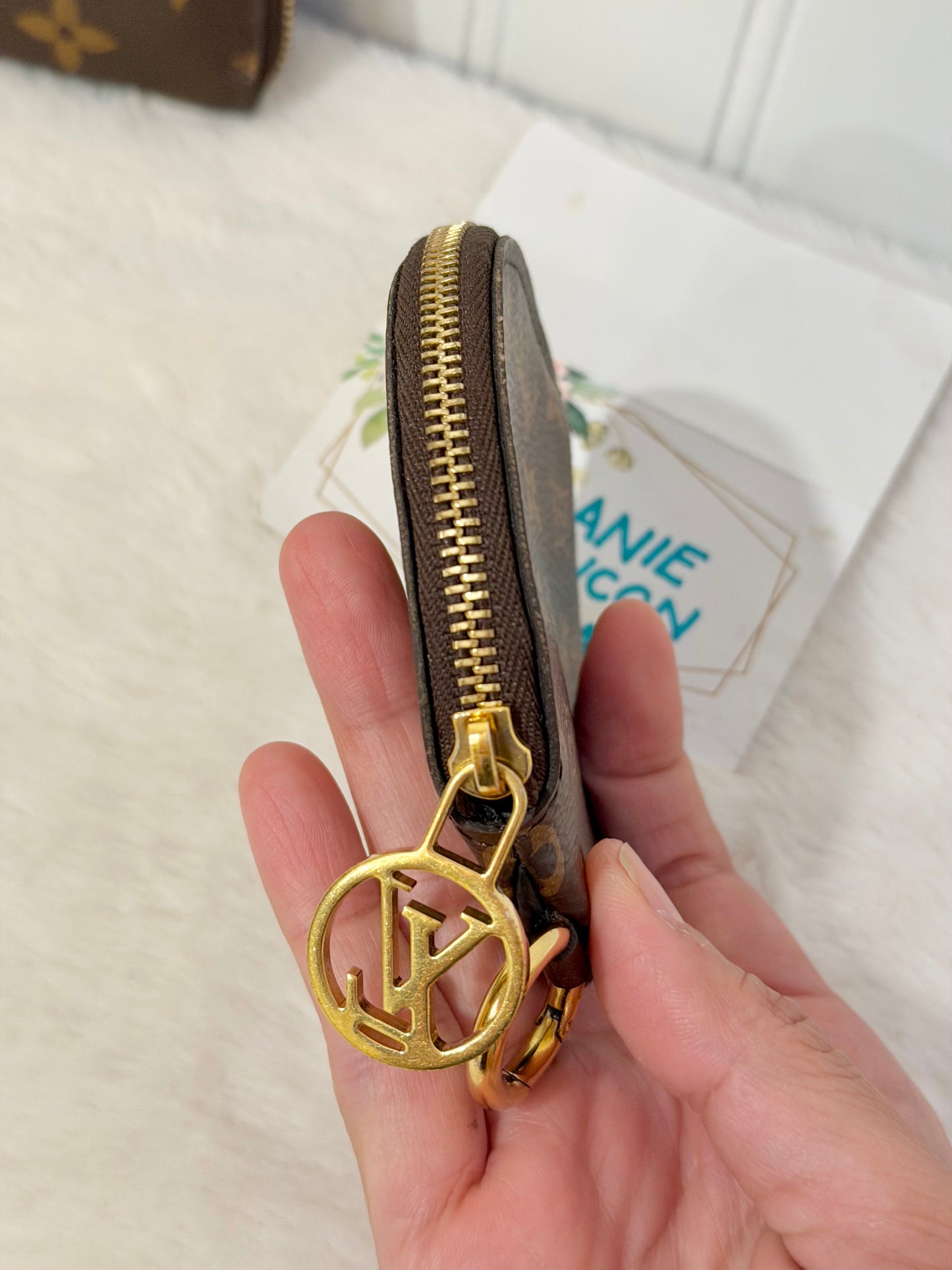 Louis Vuitton Round Coin Pouch from Trio Pouch